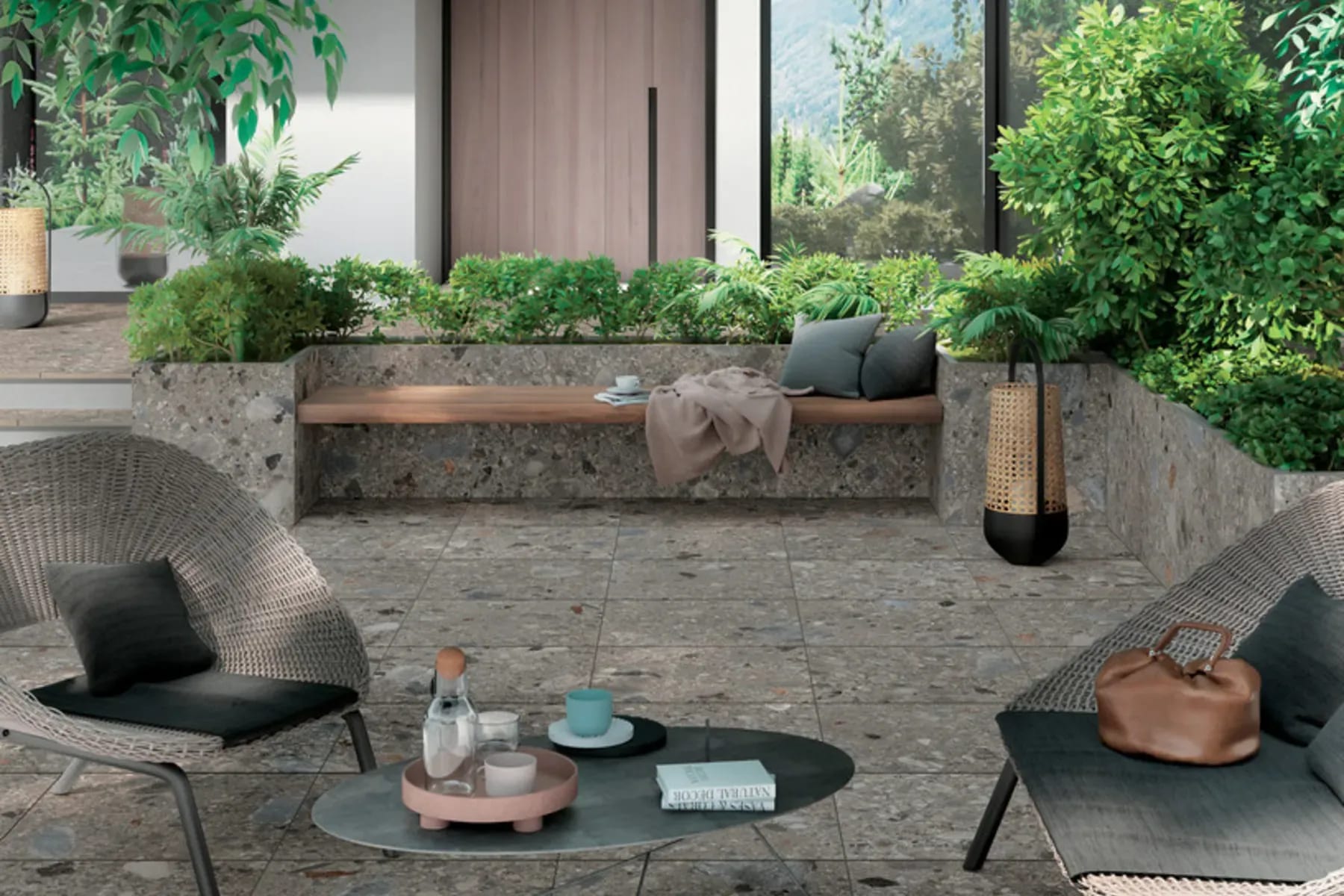 Terrasse mit frostsicheren Outdoor-Fliesen, Sitzmöbeln und Bepflanzung – Terrassenplatten von bauer raum